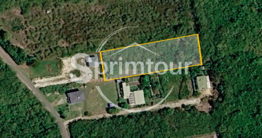 anse-bertrand - terrain constructible de 3354 m2 secteur campagne