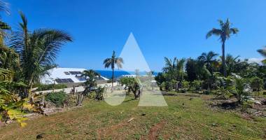 terrain constructible 454 m² à petite-Île secteur grande anse avec vue mer